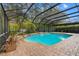 The screened in pool features a heated pool and a peaceful, private setting at 32 Allenwood Look, Ormond Beach, FL 32174
