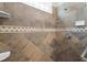 This tile shower features a shower head, faucet, and soap dish at 32 Allenwood Look, Ormond Beach, FL 32174
