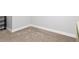 Neutral bedroom with a light carpet and white trim at 5297 Se 39 Loop, Ocala, FL 34480