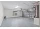 Spacious garage with epoxy floors and an automatic door at 5297 Se 39 Loop, Ocala, FL 34480