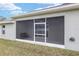 Screened-in lanai with bench, offering a relaxing outdoor space at 5297 Se 39 Loop, Ocala, FL 34480