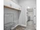 Bright laundry room featuring cabinets and modern washer and dryer at 5297 Se 39 Loop, Ocala, FL 34480