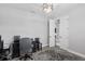Home office with neutral walls, stylish rug, and a convenient doorway adding to its accessibility at 5297 Se 39 Loop, Ocala, FL 34480