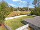 Aerial shot of a fenced-in backyard with well-maintained lawn and home at 5297 Se 39 Loop, Ocala, FL 34480
