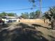 Large, fenced backyard featuring privacy and space for outdoor activities at 55 Sw Fig Tree Ln, Dunnellon, FL 34431