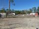 Expansive lot featuring a mix of open space and mature trees at 55 Sw Fig Tree Ln, Dunnellon, FL 34431