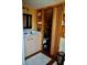 Bathroom boasts tiled vanity with modern fixtures and built-in shelving for storage at 9205 Sw 152Nd Pl, Dunnellon, FL 34432