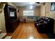 The living room is equipped with hardwood floors and ample seating space at 9205 Sw 152Nd Pl, Dunnellon, FL 34432