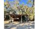 Exterior shot of outbuilding that is attached to the car port at 9205 Sw 152Nd Pl, Dunnellon, FL 34432
