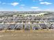 Expansive aerial view of a residential community near a scenic lake and golf course at 9581 Sw 63Rd Loop, Ocala, FL 34481