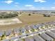 A neighborhood is adjacent to sprawling fields, enhancing privacy and offering serene landscapes at 9581 Sw 63Rd Loop, Ocala, FL 34481