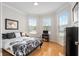 Light filled bedroom featuring a sitting area with large windows at 9581 Sw 63Rd Loop, Ocala, FL 34481