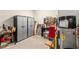 Garage interior showcasing storage, tools, and utility equipment at 9581 Sw 63Rd Loop, Ocala, FL 34481