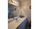 Bathroom featuring a vanity with an oval sink and a large mirror at 9638 Sw 94Th Ct # A, Ocala, FL 34481