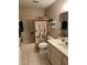 Bathroom featuring a vanity, toilet, and a shower/tub combination at 9638 Sw 94Th Ct # A, Ocala, FL 34481