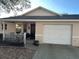 Charming single-story home featuring a one-car garage, covered entry and mature landscaping at 9638 Sw 94Th Ct # A, Ocala, FL 34481