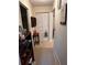 Neutral hallway with closet and carpeted floors creates a welcoming transition between rooms at 9638 Sw 94Th Ct # A, Ocala, FL 34481