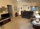 Comfortable living room featuring plush seating, classic decor, and a warm, inviting atmosphere at 9638 Sw 94Th Ct # A, Ocala, FL 34481