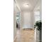 Light and airy foyer with tiled floors and neutral paint at 9704 Sw 95Th Loop, Ocala, FL 34481