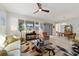 Open floor plan featuring a living room and dining area with stylish decor and lots of natural light at 9704 Sw 95Th Loop, Ocala, FL 34481