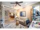 Comfortable living room adjacent to the kitchen with a couch and stylish decor at 9895 Sw 95Th Loop, Ocala, FL 34481