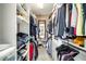 Spacious walk-in closet with ample shelving and storage at 9895 Sw 95Th Loop, Ocala, FL 34481
