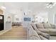 Inviting living room with light hardwood floors and a neutral color palette at 10080 Se 68Th Ct, Belleview, FL 34420