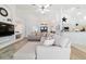 Bright living room featuring an open floor plan, recessed lighting and hardwood floors at 10080 Se 68Th Ct, Belleview, FL 34420