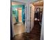 Attached bathroom and walk-in closet are separated by folding doors at 10823 Sw 83Rd Ave, Ocala, FL 34481