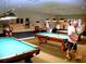 Fun billiards room with multiple pool tables, perfect for recreation and social gatherings at 11221 Sw 71St Ct, Ocala, FL 34476