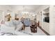 Inviting living room featuring hardwood floors, neutral colors, and built-in shelving for display at 11221 Sw 71St Ct, Ocala, FL 34476