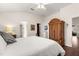 Bright main bedroom with neutral tones and lots of natural light, featuring wood look floors at 11221 Sw 71St Ct, Ocala, FL 34476