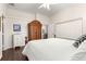 Bright main bedroom with neutral tones and lots of natural light, featuring wood look floors at 11221 Sw 71St Ct, Ocala, FL 34476