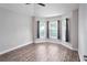 Bedroom filled with natural light from the bay windows at 12164 Se 85Th Ct, Belleview, FL 34420