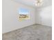 Tiled floor bedroom featuring a window and door at 17755 Se 117Th Cir, Summerfield, FL 34491