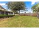 Well-maintained backyard with lush green grass and manicured shrubbery at 2840 Se 35Th St, Ocala, FL 34471