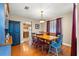 Cozy dining room with hardwood floors, and a traditional light fixture at 2840 Se 35Th St, Ocala, FL 34471