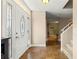 Inviting foyer with tile flooring, a decorative front door, and a view of the staircase at 2840 Se 35Th St, Ocala, FL 34471