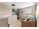 Hallway featuring seating, and a window for natural light at 2840 Se 35Th St, Ocala, FL 34471