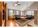 Bright and airy living room featuring hardwood floors, comfortable sofas, and ample natural light at 2840 Se 35Th St, Ocala, FL 34471