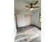 Bedroom featuring a closet, a window, and light wood floors at 301 Oak Track Way, Ocala, FL 34472