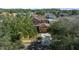 Aerial view of a two-story home with a well-manicured lawn and large driveway at 3999 Sw 51St Ct, Ocala, FL 34474