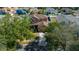 Aerial view of a two-story home with a well-manicured lawn and large driveway at 3999 Sw 51St Ct, Ocala, FL 34474