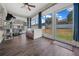 Relaxing sunroom featuring an abundance of windows and outdoor views at 3999 Sw 51St Ct, Ocala, FL 34474