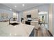 Bright kitchen with white quartz countertops, modern cabinets, and stainless steel appliances at 4160 Sw 98Th St, Ocala, FL 34476