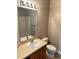 Standard bathroom with sink, toilet and shower/tub combo at 4525 Sw 52Nd Cir # 105, Ocala, FL 34474