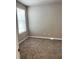 Bedroom with neutral colored walls and carpet floors at 4525 Sw 52Nd Cir # 105, Ocala, FL 34474