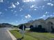 Low angle street view of well maintained homes in a quiet community at 5500 Nw 23Rd Pl, Ocala, FL 34482