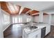 Bright kitchen featuring granite counters, stainless appliances, and a sink island, under a stained wood ceiling at 5526 Se 170Th Ct, Ocklawaha, FL 32179