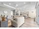 Inviting living space blending seamlessly with the kitchen, featuring neutral tones and lots of natural light at 5728 Sw 90Th Court Rd, Ocala, FL 34481